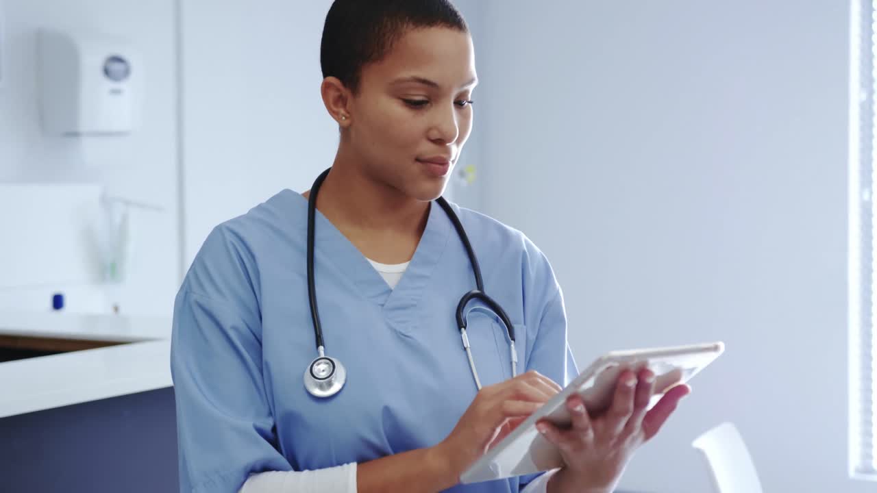 Female doctor using digital tablet in hospital 4k