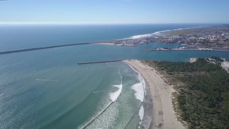 Famous-cabedelo-beach-in-Viana-do-Castelo-in-Portugal,-drone-shot-with-sun