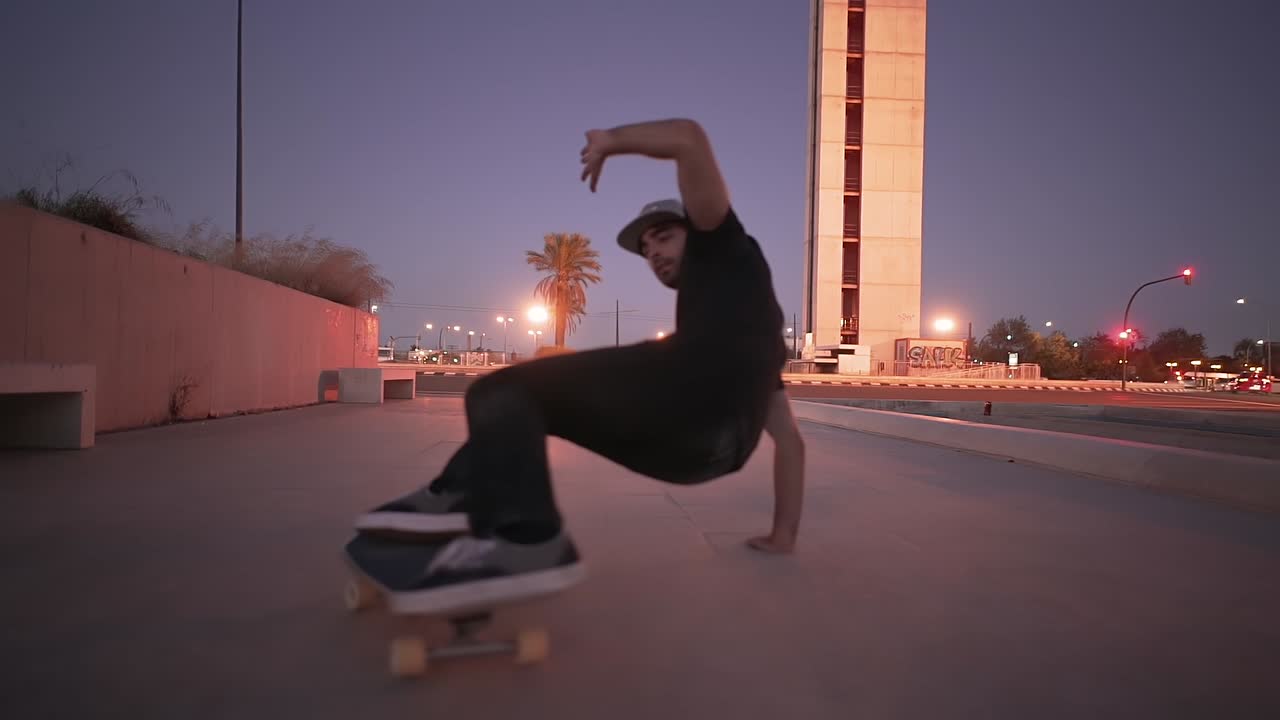 Skateboarding Tricks at Night in a City Park