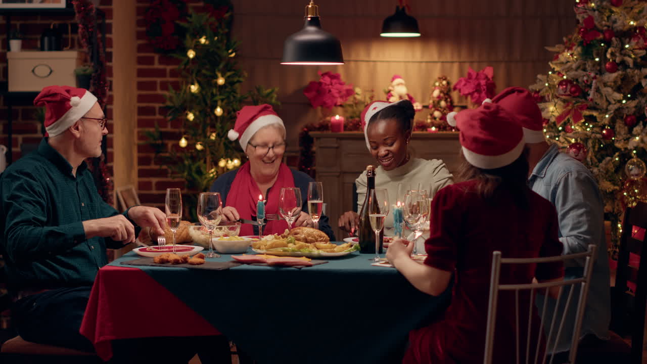 Group of People Celebrating Christmas Dinner Together