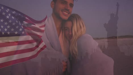 animation of flag of united states of america over happy couple and statue of liberty