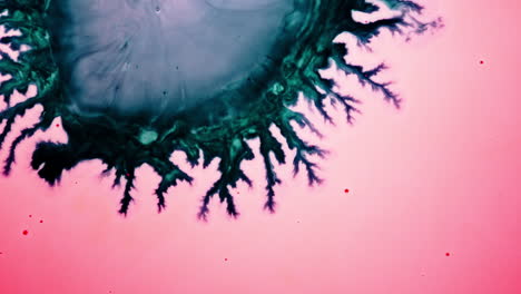 colorful substances mixing in macro shot, with vivid swirling liquid textures