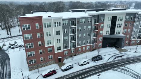 large apartment complex on snowy day