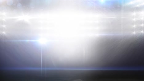 animación de luces en movimiento borrosas y puntos de luz bokeh en un estadio deportivo iluminado