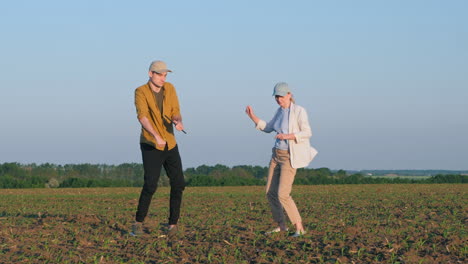 couple dancing in a field