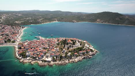 slowly moving drone shot of an old croatian town