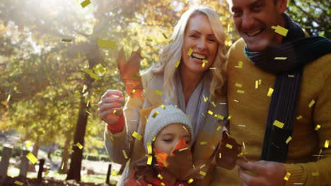 enjoying autumn leaves in park, family with confetti animation around them