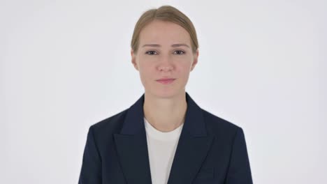 rejecting businesswoman shaking head in denial on white background