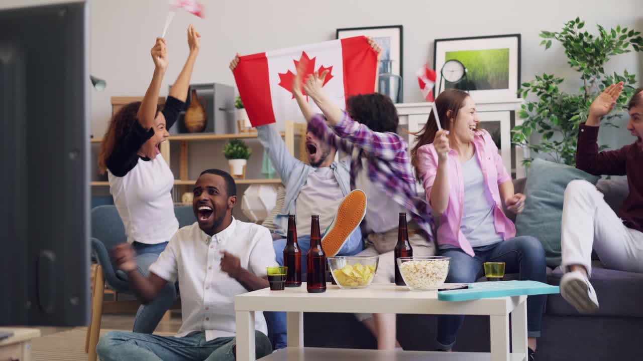 Friends celebrating a Canadian victory