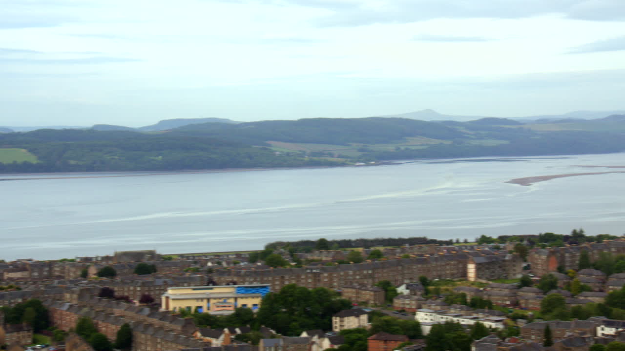 Panning shot of the river Tay and Dundee at Law hill