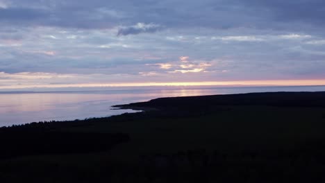 seashore from land during sunset