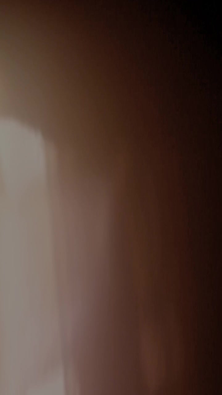 Abstract Light Leak Transition with Warm Brown Tones