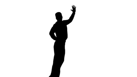 silhouette of man jumping raising legs on white background