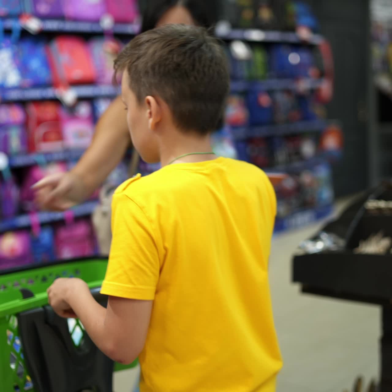 Boy shopping to school