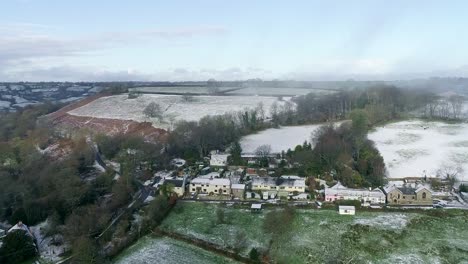 wintry landscape over a quaint english hamlet