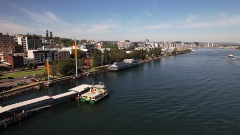Queens Wharf Ferry Terminal On Hunter River In Newcastle, New South Wales, Australia. aerial shot