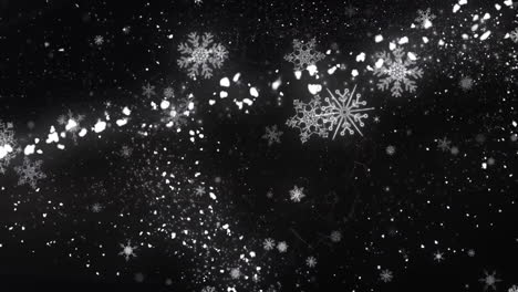 Animation-of-snow-falling-on-black-background