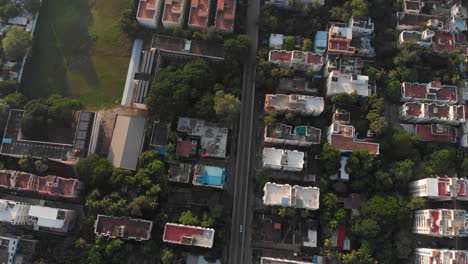 Aerial-top-view-over-Chennai-City-with-main-road-surrounded-by-poor-residential-blocks-in-India