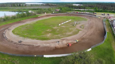 4k drone video of stock car racing at mitchell raceway in fairbanks, ak during sunny summer evening-3