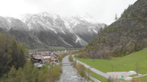 aerial footage of a small river in the austrian alps - Sölden, Austria - drone