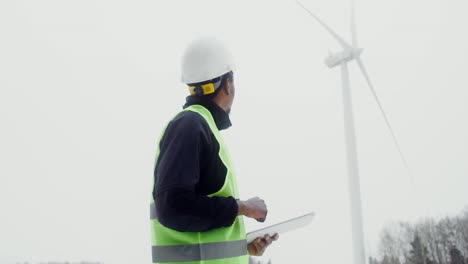 wind turbine technician working outdoors