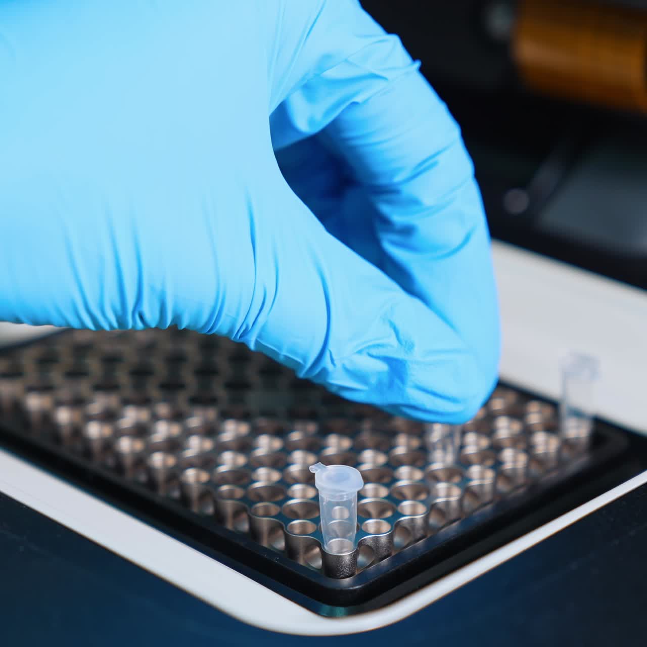 Blood samples analyzing. Testing blood for new virus. Blood research in scientific workplace. Professional medical analyzer at the laboratory