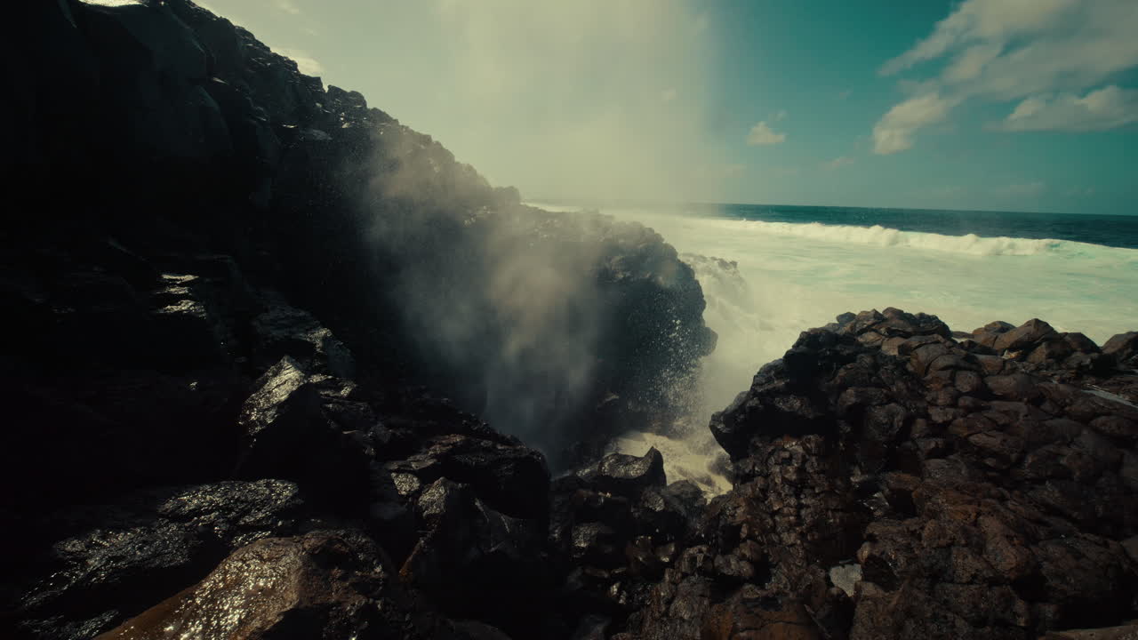 Powerful Waves Crashing Through a Volcanic Blowhole