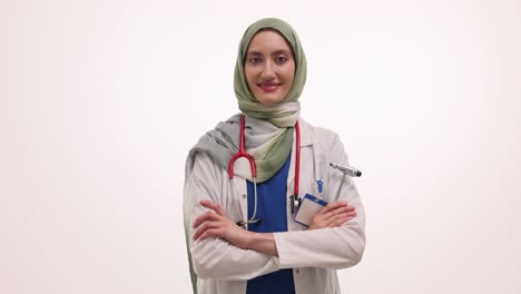 female muslim doctor in white coat with stethoscope