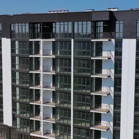 new high-rise residential building in city suburb. new apartment houses. video of modern buildings.