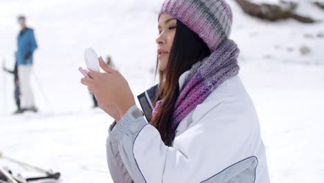 Young-woman-blowing-a-kiss-at-the-camera