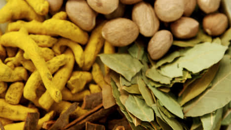 nutmeg, bay leaf, cinnamon stick and turmeric 4k