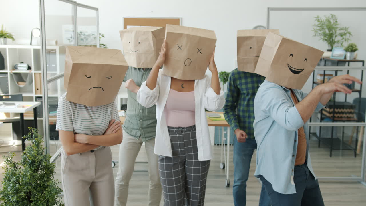 People Dancing with Paper Bag Heads in Office