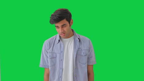 sad, stressed and depressed indian boy green screen