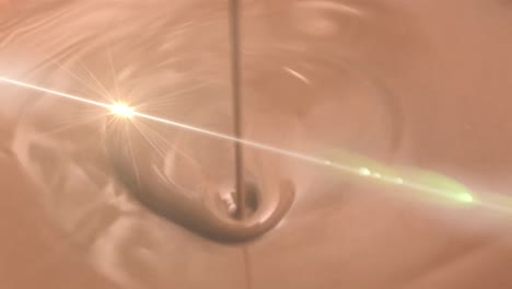 animation of light over melted milk chocolate