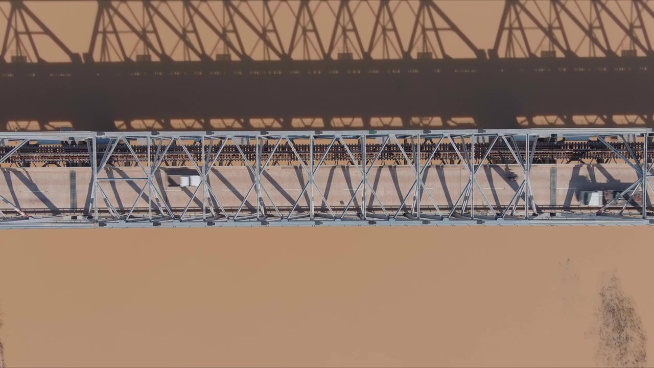 The Burdekin Bridge, located in North Queensland, Australia. An iconic location in the Burdekin. Shot with a drone, birdseye view over the bridge.