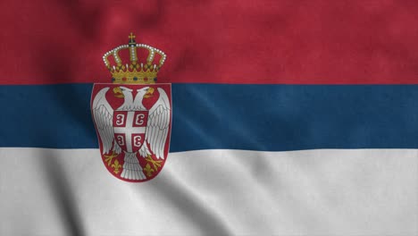 serbia flag waving in the wind with high quality texture. national flag of serbia