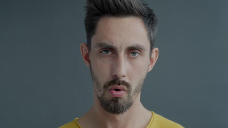man with a neutral expression