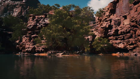 colorado river with gorgeous sandstone walls and canyons