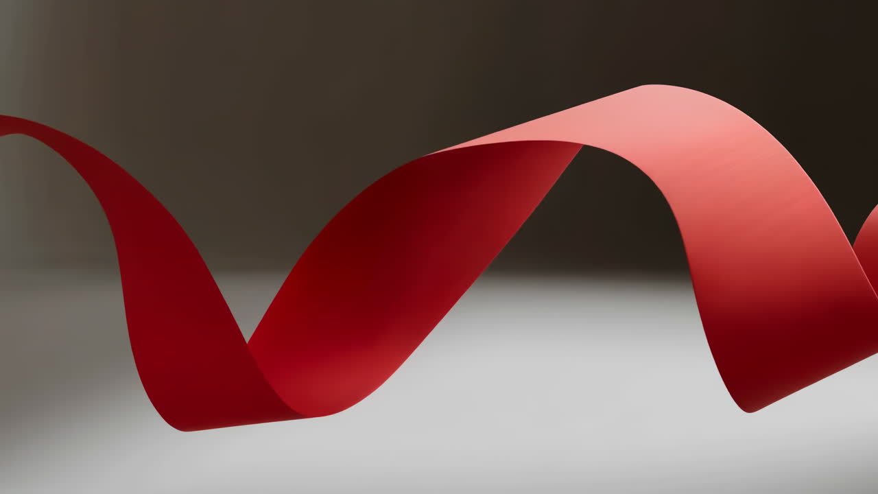 Abstract Red Ribbon Flowing in a Smooth Wave Motion