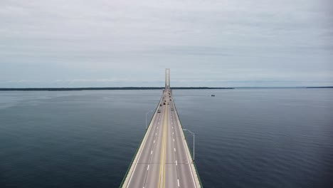 aerial mackinac bridge approach on roadway