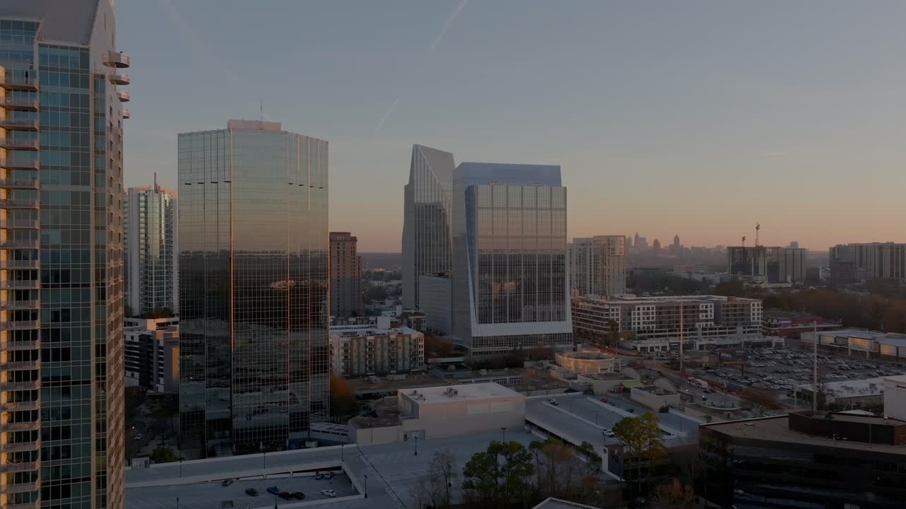 Buckhead uptown commercial and residential district of Atlanta at sunset, Georgia, Drone shot, Establishing