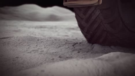 un rover lunar que se mueve en la superficie de la luna