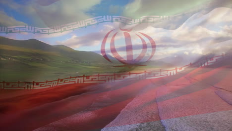 digital composition iran flag waving against aerial view of waves in the sea