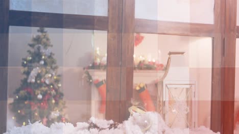 Animation-of-squares-in-red,-white-and-blue-of-flag-of-america,-over-christmas-tree-and-decorations