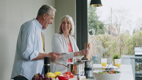 older couple cooking together in the kitchen