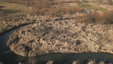 Aerial-drone-view-of-s-curved-river,-elegant-shot