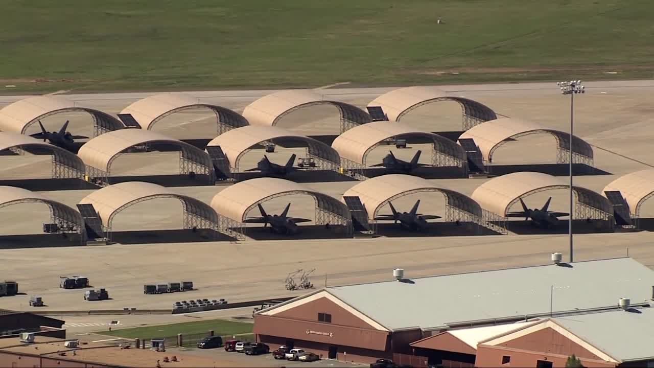 LANGLEY MILITARY AIRCRAFT F22 JETS IN HANGER BAY FROM DRONE