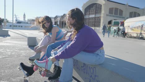 friends roller skating at the port