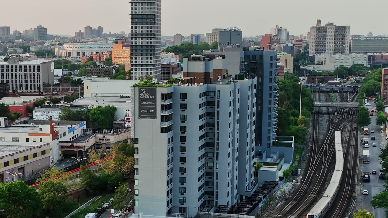 Drone view of urban New York with train tracks and buildings