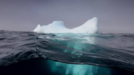 big iceberg floating in the ocean